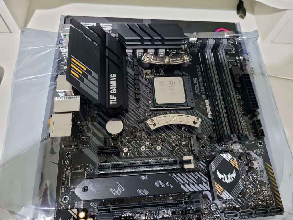 A Ryzen 5900X installed in my Asus motherboard with Noctua CPU cooler brackets installed