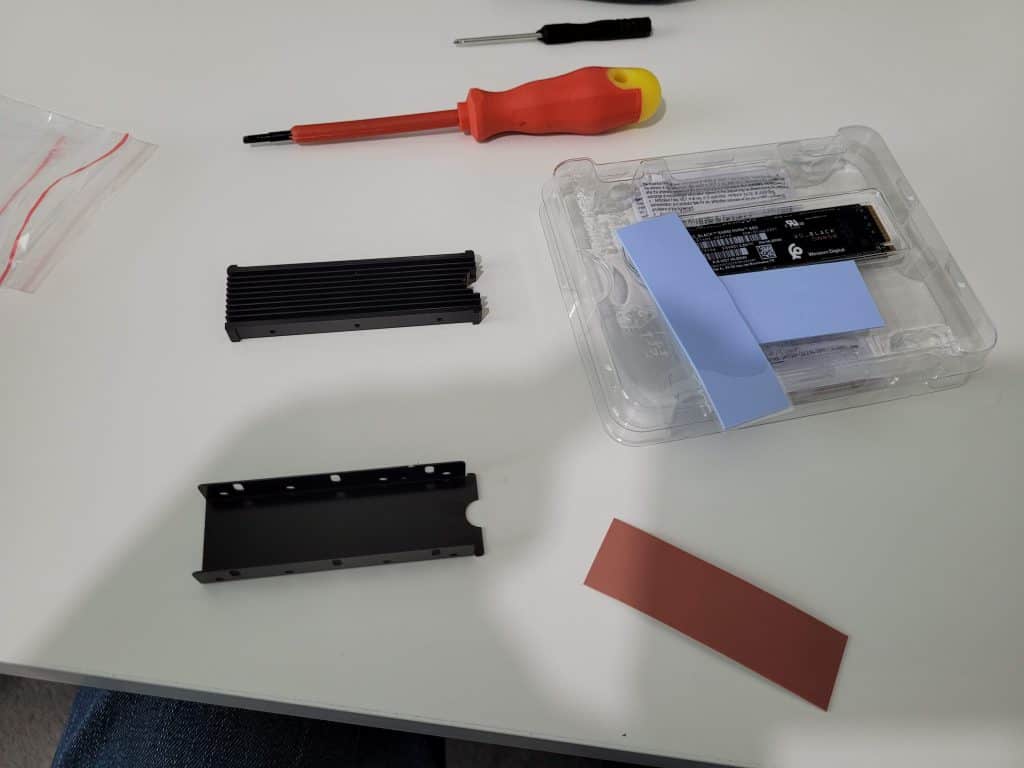 Various parts of a third party M.2 NVMe SSD heatsink