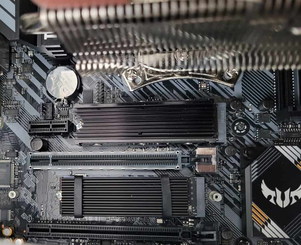 Two M.2 NVMe drives installed in an Asus B550 Plus motherboard