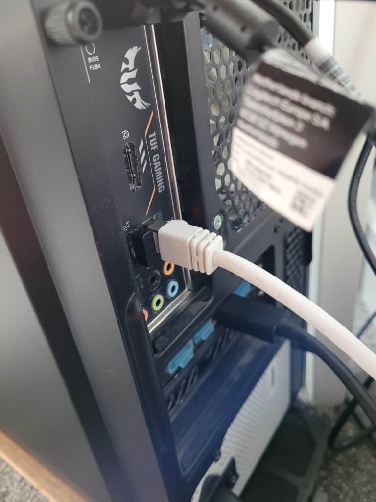 An Ethernet cable going into the back of my computer