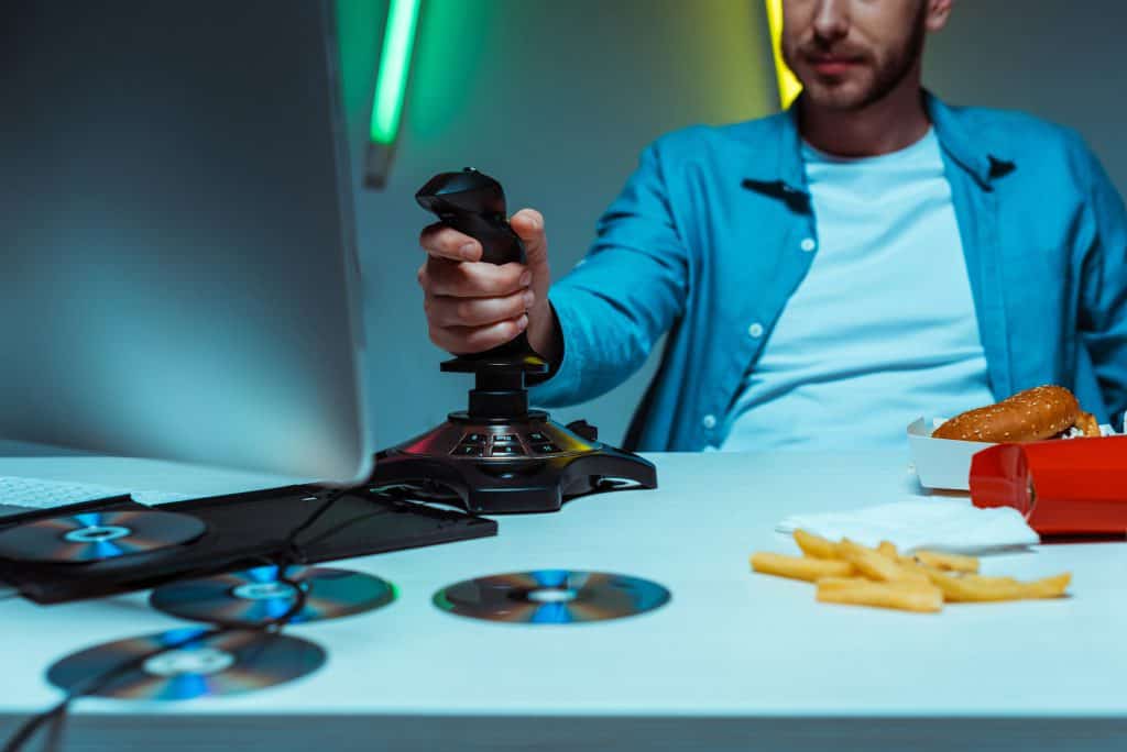 Someone gaming using a joystick and nothing else