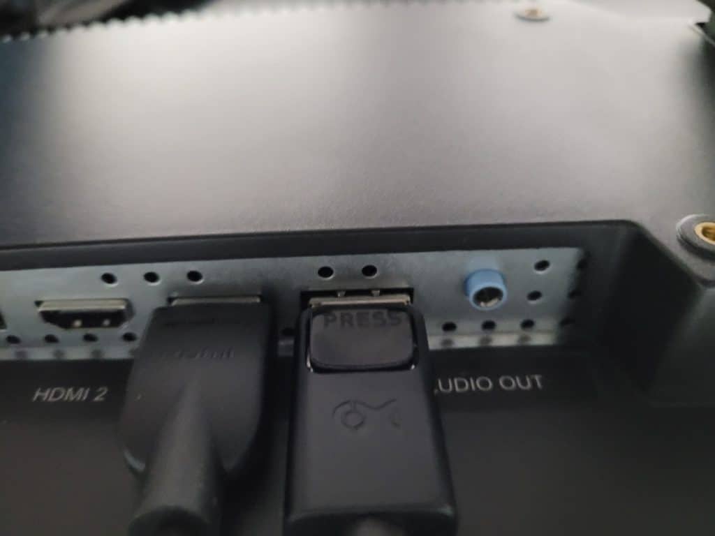 Two cables plugged into the back of my PC monitor