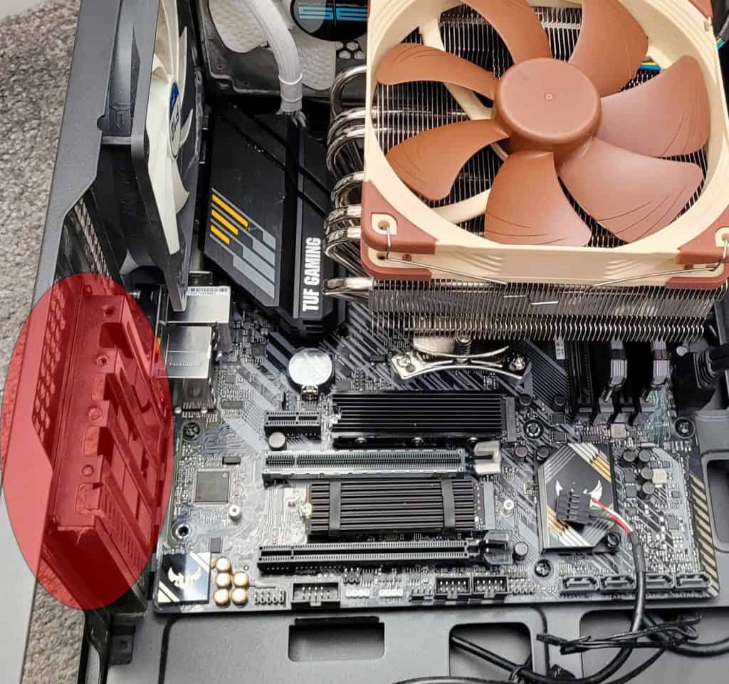 The PCIe case screw holes where the GPU is screwed in to