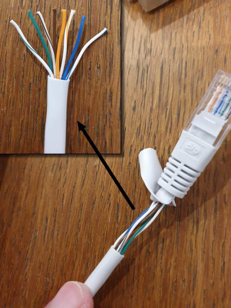 Opening up a gigabit ethernet cable and showing the 8 wires within it