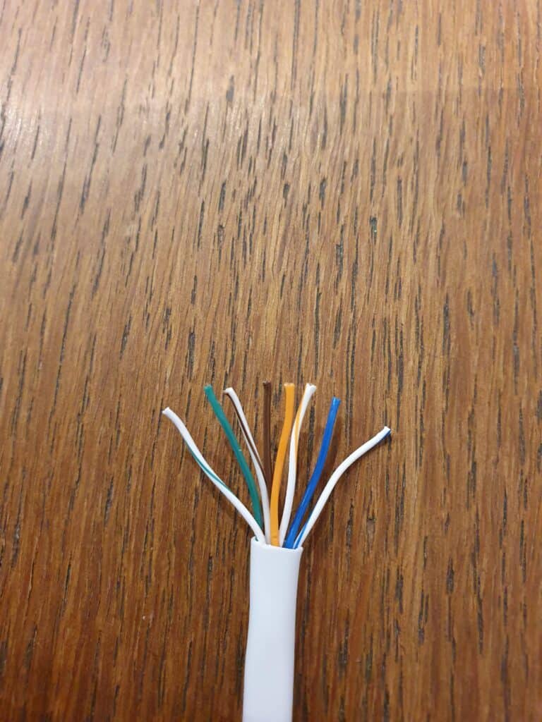 A cut Ethernet cable showing the 8 individual wires