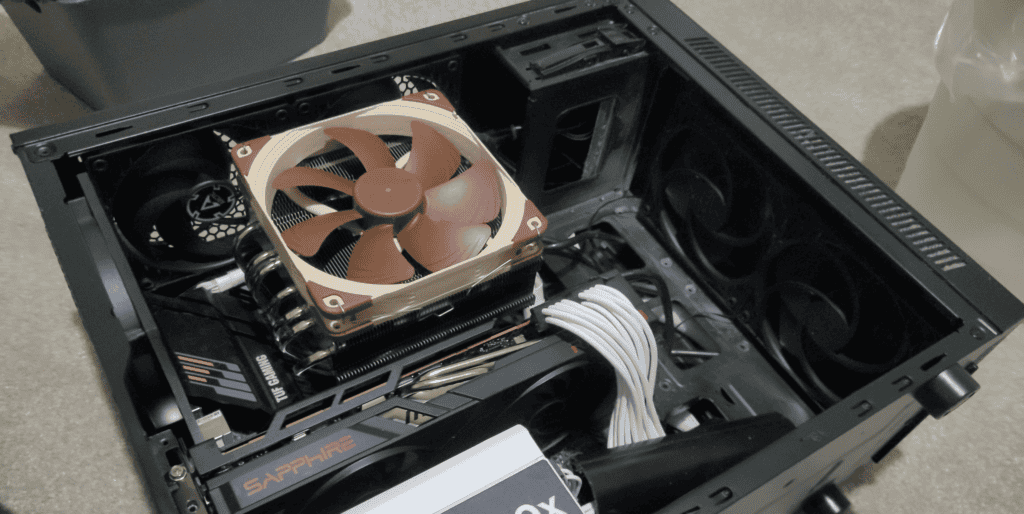 A look inside my PC case and showing the Noctua cooler and fan
